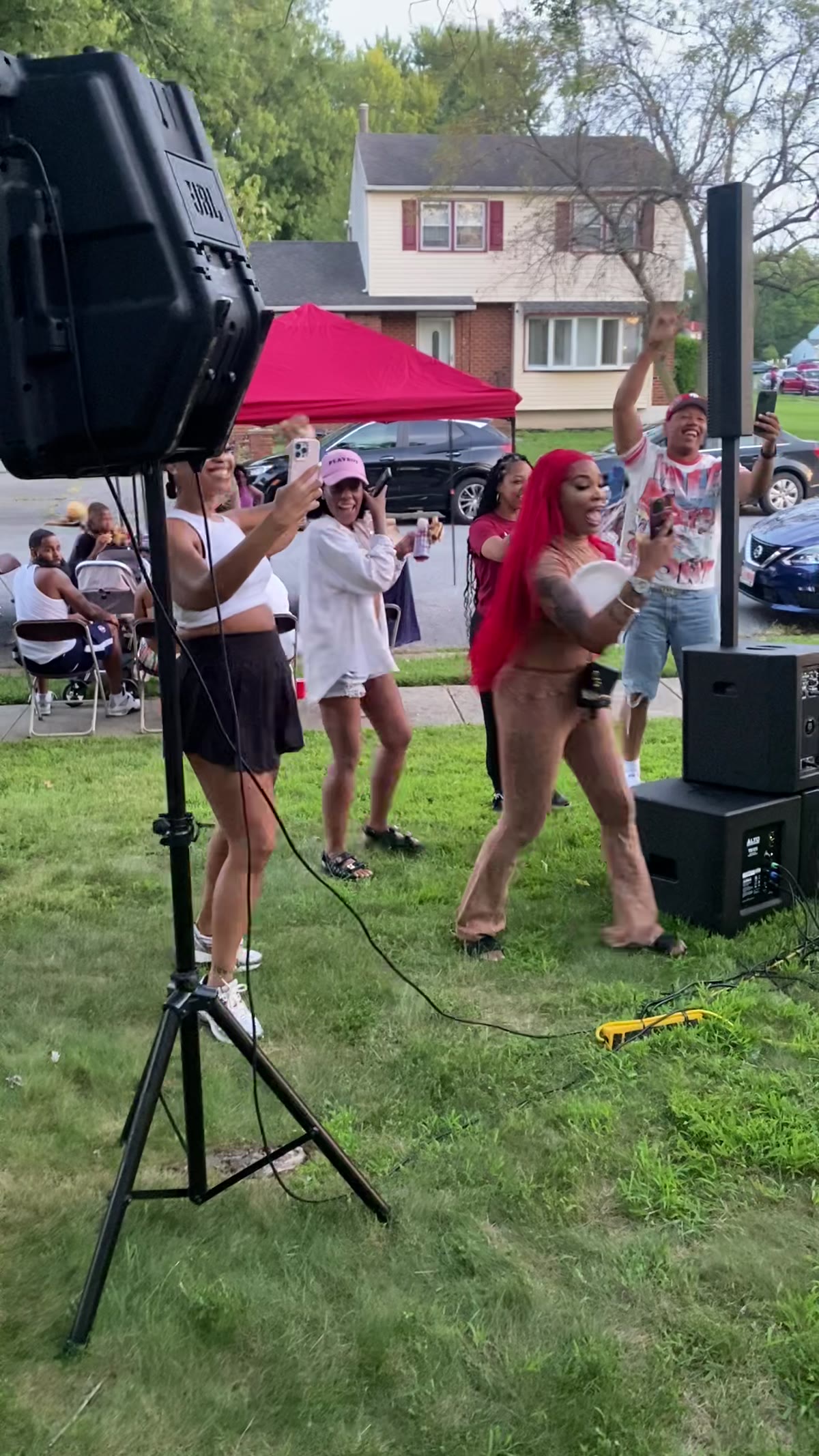 Community celebration with families and guests outdoors